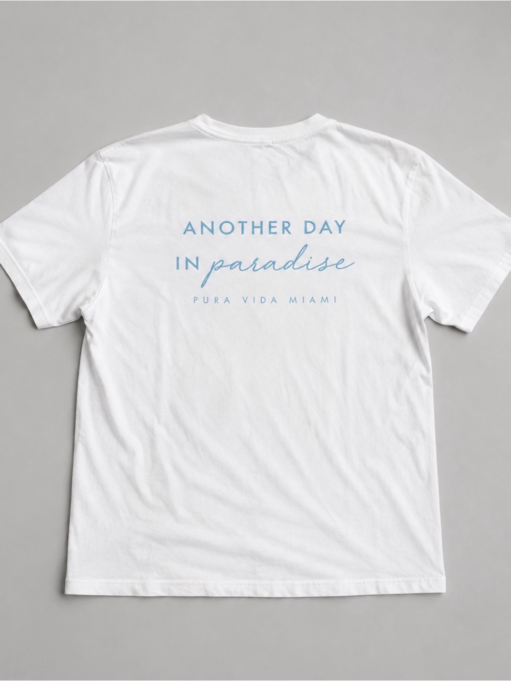 Pura Vida Miami Men’s "Another Day in Paradise" White Graphic Tee